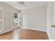Spacious bedroom with wood flooring and window at 25406 Lexington Oaks Blvd, Wesley Chapel, FL 33544