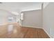 Bright dining room with hardwood floors and access to kitchen at 25406 Lexington Oaks Blvd, Wesley Chapel, FL 33544