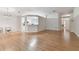 Spacious dining area with hardwood floors and kitchen access at 25406 Lexington Oaks Blvd, Wesley Chapel, FL 33544