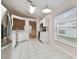 Updated kitchen with stainless steel appliances and white cabinetry at 25406 Lexington Oaks Blvd, Wesley Chapel, FL 33544