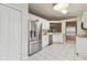 Updated kitchen with stainless steel appliances and white cabinetry at 25406 Lexington Oaks Blvd, Wesley Chapel, FL 33544