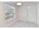 Bright kitchen with white cabinets and stainless steel appliances at 25406 Lexington Oaks Blvd, Wesley Chapel, FL 33544