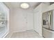 Updated kitchen with stainless steel appliances and white cabinetry at 25406 Lexington Oaks Blvd, Wesley Chapel, FL 33544
