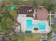 Aerial view of community pool, playground, and spa at 25406 Lexington Oaks Blvd, Wesley Chapel, FL 33544