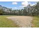 Sand volleyball court with basketball court nearby at 25406 Lexington Oaks Blvd, Wesley Chapel, FL 33544