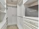 Large walk-in closet with ample shelving and drawers at 25406 Lexington Oaks Blvd, Wesley Chapel, FL 33544
