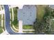 Aerial view of home and surrounding landscape at 27325 Mistflower Dr, Wesley Chapel, FL 33544