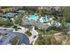 Community pool, clubhouse, tennis courts and playground at 27325 Mistflower Dr, Wesley Chapel, FL 33544