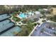 Resort-style community with pools, tennis courts, playground, and clubhouse at 27325 Mistflower Dr, Wesley Chapel, FL 33544
