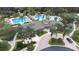 Aerial view of community pool and clubhouse at 27325 Mistflower Dr, Wesley Chapel, FL 33544