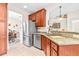 Kitchen features stainless steel appliances and granite countertops at 27325 Mistflower Dr, Wesley Chapel, FL 33544