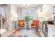 Cozy kitchen breakfast nook with two armchairs at 27325 Mistflower Dr, Wesley Chapel, FL 33544