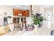 Kitchen with granite counters and wood cabinets at 27325 Mistflower Dr, Wesley Chapel, FL 33544