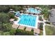 Lap pool with water slide and lounge area at 27325 Mistflower Dr, Wesley Chapel, FL 33544