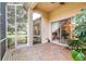 Relaxing screened porch with access to backyard at 27325 Mistflower Dr, Wesley Chapel, FL 33544