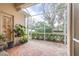 Spacious screened porch overlooking the backyard at 27325 Mistflower Dr, Wesley Chapel, FL 33544