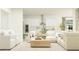 Open living room and kitchen with comfortable sectional sofa at 31537 Cardinal Yard Dr, San Antonio, FL 33576