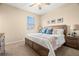 King-size bedroom with carpeted floor and ceiling fan at 3429 Durrance St, New Port Richey, FL 34655