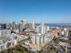 Aerial view of city skyline with luxury condo building at 400 4Th S Ave # 506, St Petersburg, FL 33701