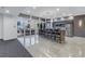 Community kitchen with stainless steel appliances and bar seating at 400 4Th S Ave # 506, St Petersburg, FL 33701