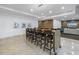 Community room boasts a long table with bar stools, and a lounge area with flat screen TV at 400 4Th S Ave # 506, St Petersburg, FL 33701