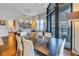 Elegant dining area with a dark wood table and balcony access at 400 4Th S Ave # 506, St Petersburg, FL 33701