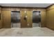 Modern elevators with wood and metal finishes at 400 4Th S Ave # 506, St Petersburg, FL 33701