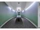 Modern hallway with green walls and a table at 400 4Th S Ave # 506, St Petersburg, FL 33701