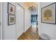 Bright hallway with hardwood floors and artwork at 400 4Th S Ave # 506, St Petersburg, FL 33701