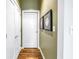 Bright hallway with hardwood floors and artwork at 400 4Th S Ave # 506, St Petersburg, FL 33701