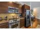 Modern kitchen with stainless steel appliances and granite countertops at 400 4Th S Ave # 506, St Petersburg, FL 33701