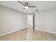 Bright bedroom with wood-look tile floor and ceiling fan at 4811 Bayshore Blvd # 302, Tampa, FL 33611