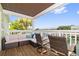 Relaxing waterfront deck with wicker furniture and canal view at 5012 Starfish Se Dr # C, St Petersburg, FL 33705