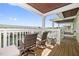 Waterfront deck with wicker chairs and a view of the canal at 5012 Starfish Se Dr # C, St Petersburg, FL 33705