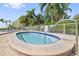 Relaxing community hot tub surrounded by landscaping at 5012 Starfish Se Dr # C, St Petersburg, FL 33705
