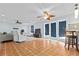 Spacious living room with tile floors and ceiling fans at 5012 Starfish Se Dr # C, St Petersburg, FL 33705