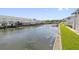 Boats docked at waterfront homes with lush green grass at 5012 Starfish Se Dr # C, St Petersburg, FL 33705