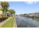 Peaceful waterfront walkway with boats and lush landscaping at 5012 Starfish Se Dr # C, St Petersburg, FL 33705