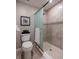 Bathroom with a toilet and large walk-in shower at 661 Segovia Ne Ct, St Petersburg, FL 33703