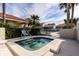 Community hot tub with seating and surrounding landscaping at 661 Segovia Ne Ct, St Petersburg, FL 33703
