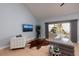 Light and airy living room with hardwood floors and access to patio at 661 Segovia Ne Ct, St Petersburg, FL 33703