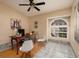 Home office with a desk, chairs, and large window at 661 Segovia Ne Ct, St Petersburg, FL 33703
