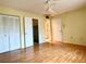 Spacious bedroom with wood flooring and ample closet space at 6800 20Th N Ave # 508, St Petersburg, FL 33710