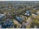 Aerial view showcasing a house, neighborhood, and distant ocean at 7408 S Elliott St, Tampa, FL 33616