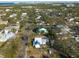 Wide aerial view showing house and neighborhood at 7408 S Elliott St, Tampa, FL 33616