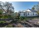 House exterior showcasing back yard and shed at 7408 S Elliott St, Tampa, FL 33616