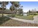 Park pavilion with walking path and view of lake at 8428 Parkwood Blvd, Seminole, FL 33777