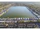 Aerial view of lakefront community with homes at 8841 Walnut Gable Ct, Riverview, FL 33578