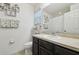 Clean bathroom with single sink vanity and shower/tub combo at 8841 Walnut Gable Ct, Riverview, FL 33578