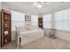 Bedroom with daybed and built-in shelves at 8841 Walnut Gable Ct, Riverview, FL 33578